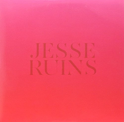 Jesse Ruins - A Bookshelf Sinks Into The Sand